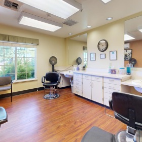 a salon with a large window