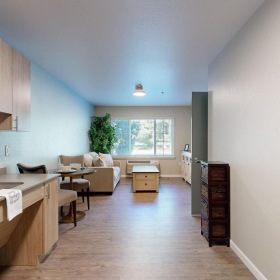 a kitchen with a wood floor