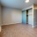 a room with a wood floor and a wood floor